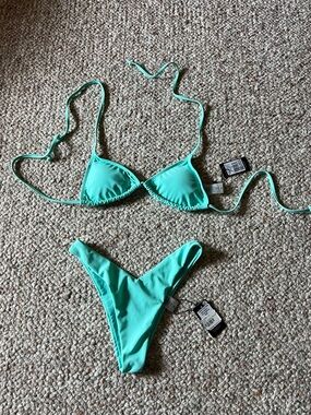 New With Tags.  Bikini Set in Aqua Green - Small top, Medium bottom